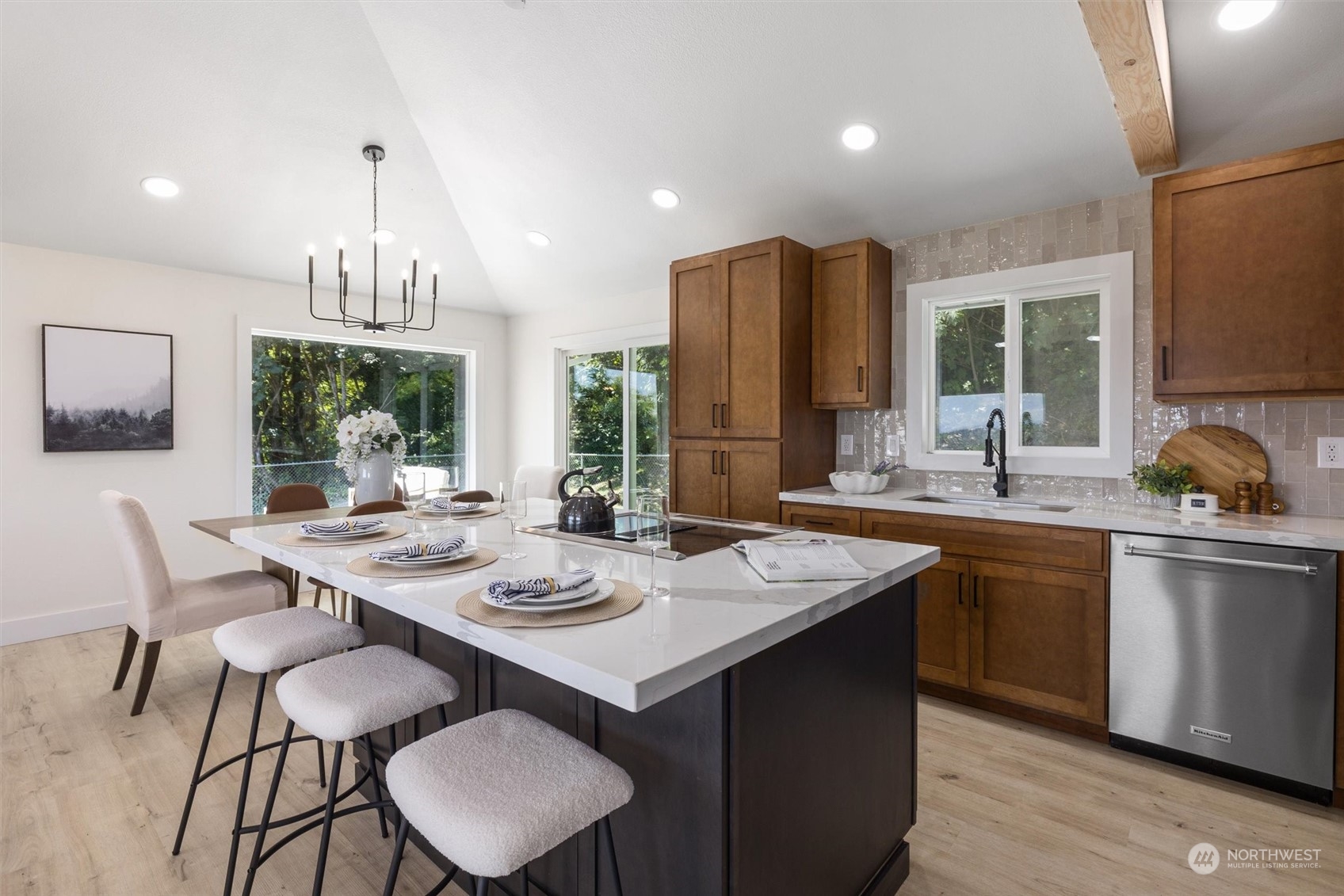 6314 Larimer Road Everett, WA 98208 - Photo 15 of 40 a kitchen with a sink cabinets and wooden floor