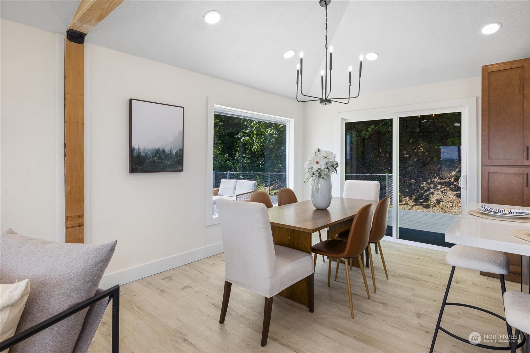 6314 Larimer Road Everett, WA 98208 - Photo 16 of 40 a view of a dining room with furniture window and outside view