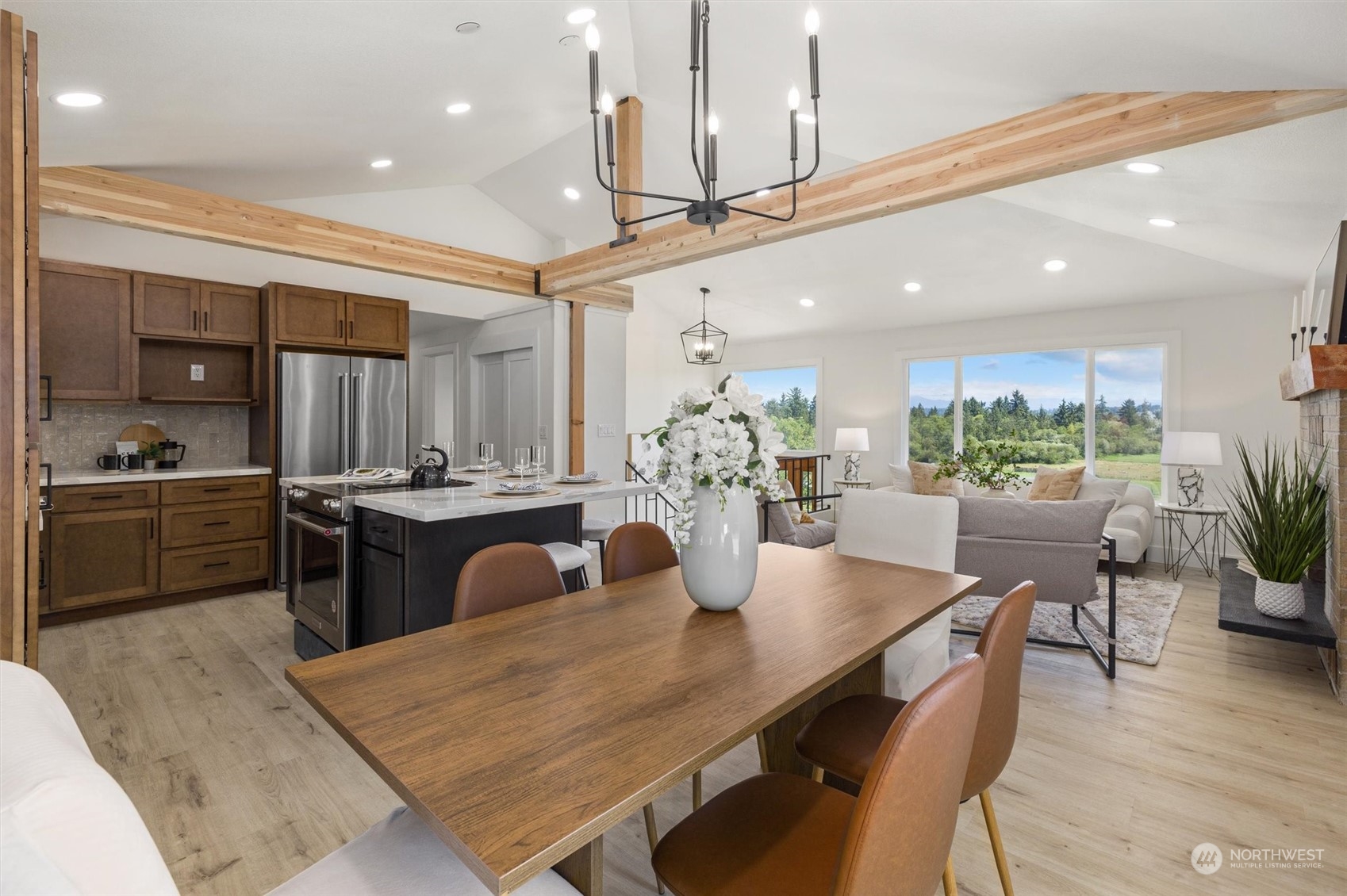 6314 Larimer Road Everett, WA 98208 - Photo 17 of 40 a kitchen with a table and chairs in it