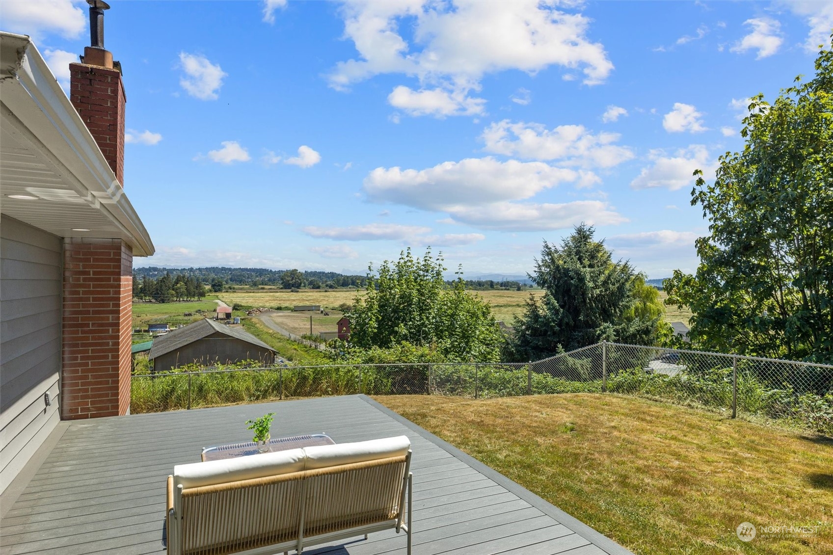 6314 Larimer Road Everett, WA 98208 - Photo 2 of 40 a view of a chairs and table on the wooden floor
