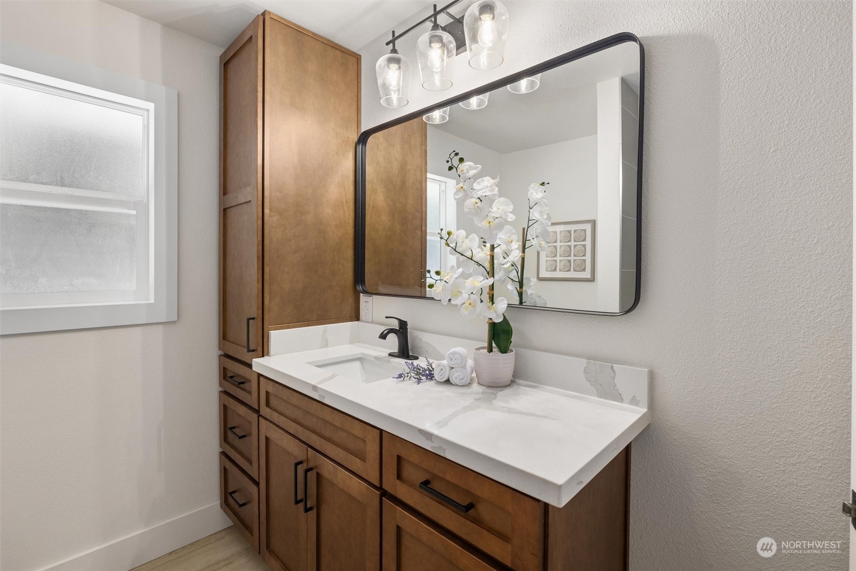 6314 Larimer Road Everett, WA 98208 - Photo 21 of 40 a bathroom with a sink vanity and a mirror