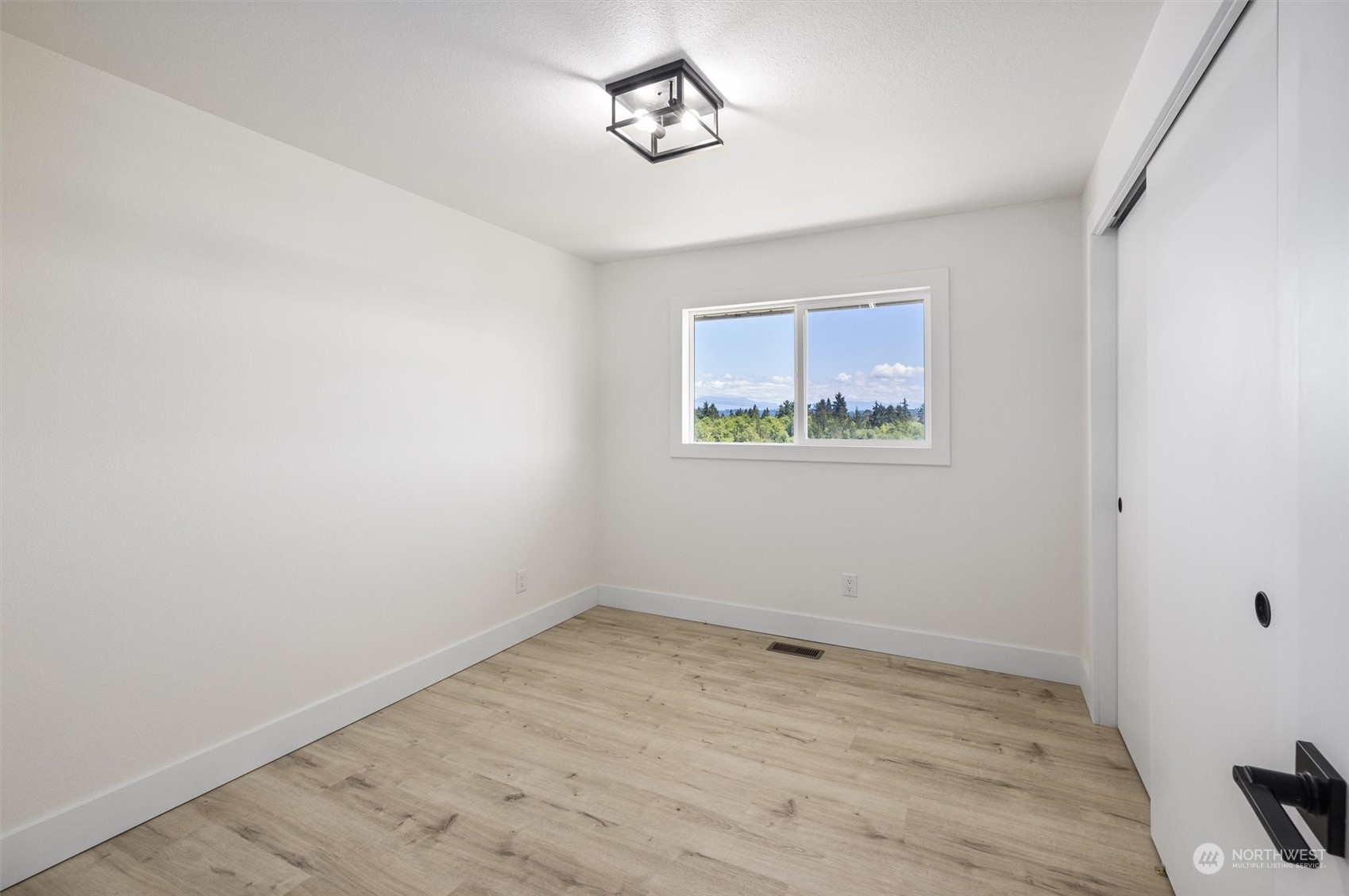 6314 Larimer Road Everett, WA 98208 - Photo 23 of 40 an empty room with a window