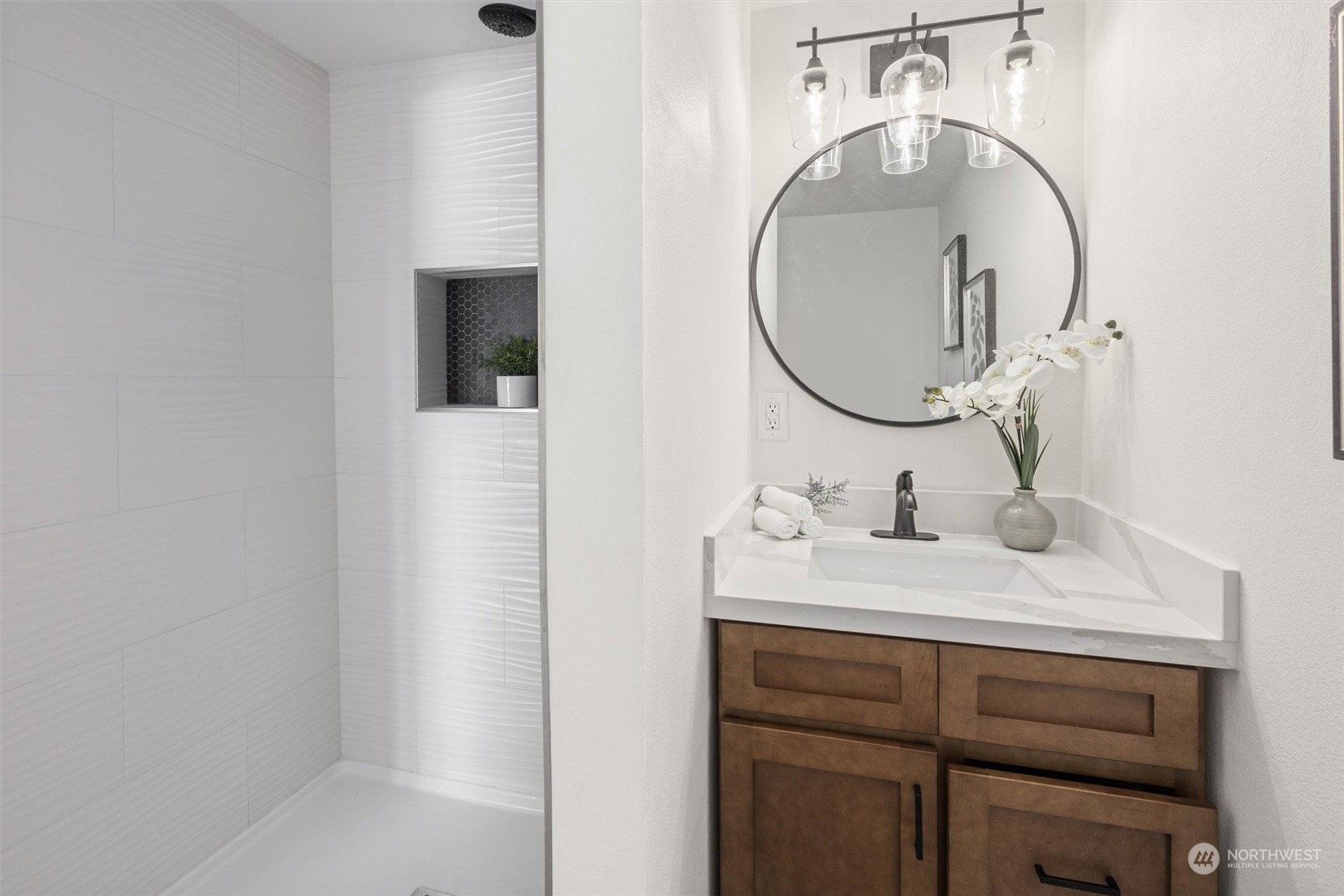 6314 Larimer Road Everett, WA 98208 - Photo 28 of 40 a bathroom with a sink and a mirror