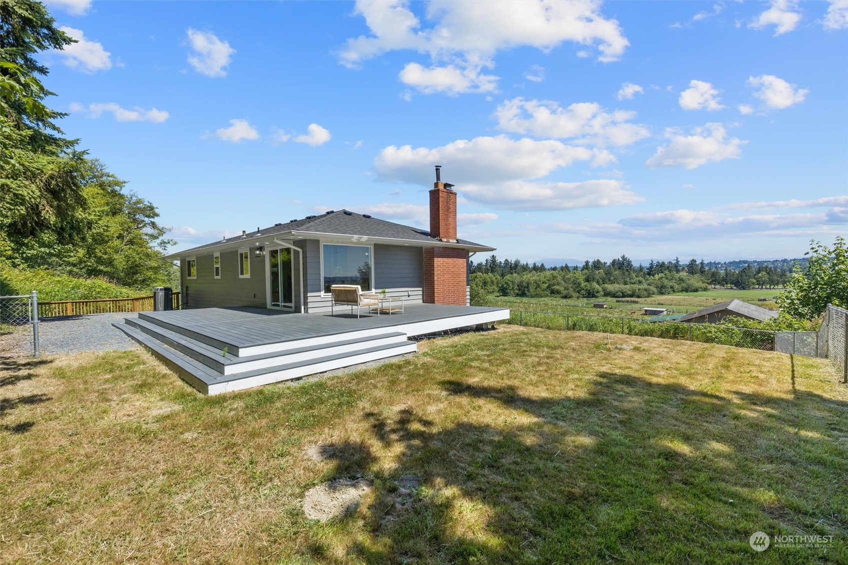 6314 Larimer Road Everett, WA 98208 - Photo 30 of 40 a front view of a house with a yard