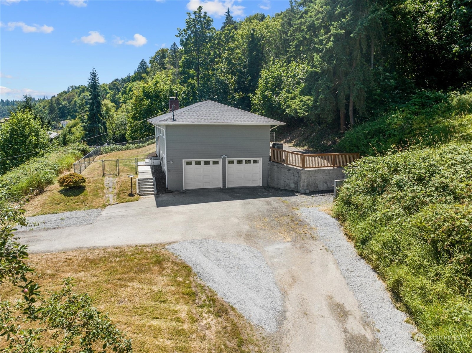 6314 Larimer Road Everett, WA 98208 - Photo 33 of 40 a view of a house with a yard and large tree