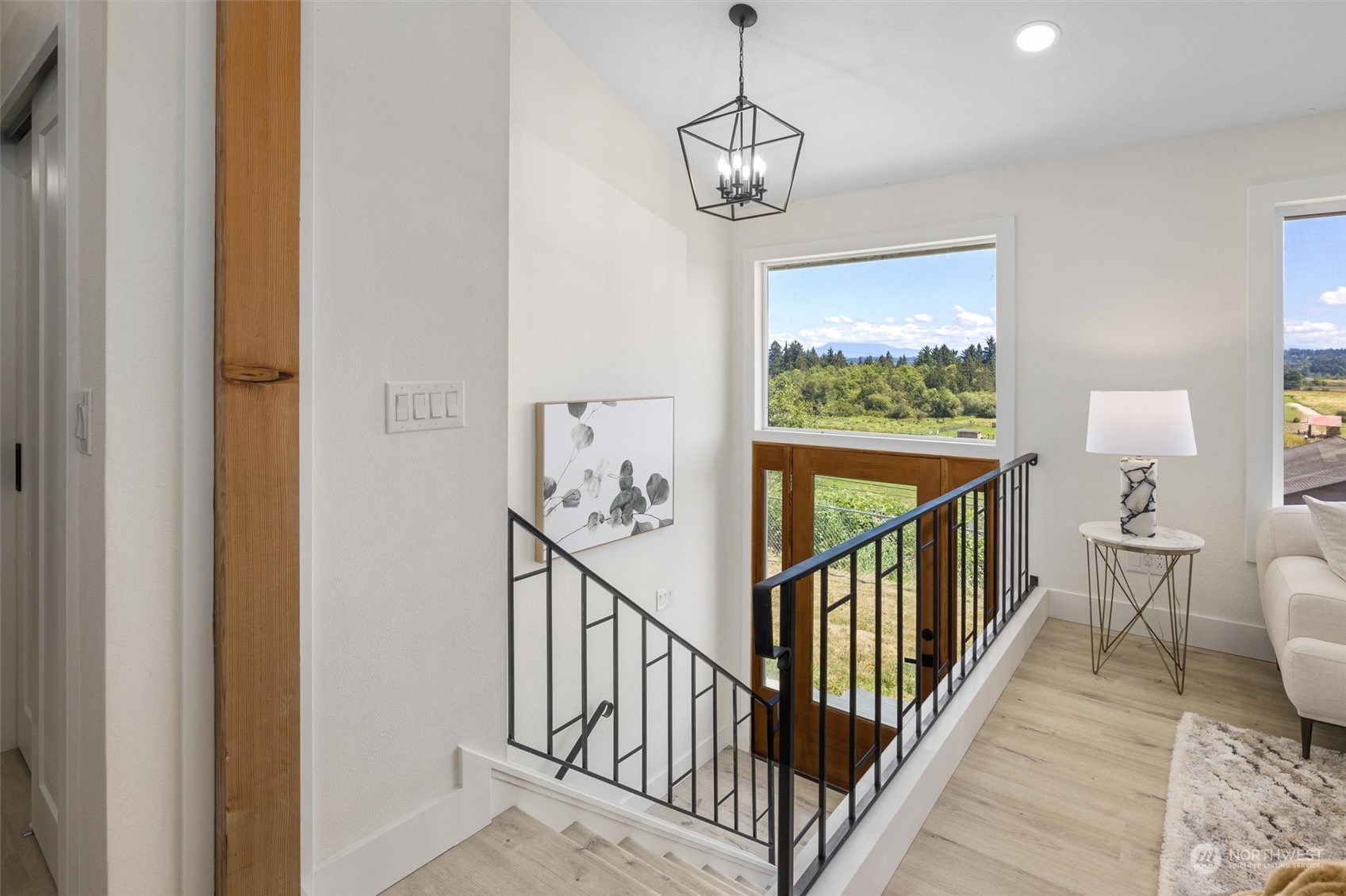 6314 Larimer Road Everett, WA 98208 - Photo 4 of 40 a view of entryway and hall with wooden floor