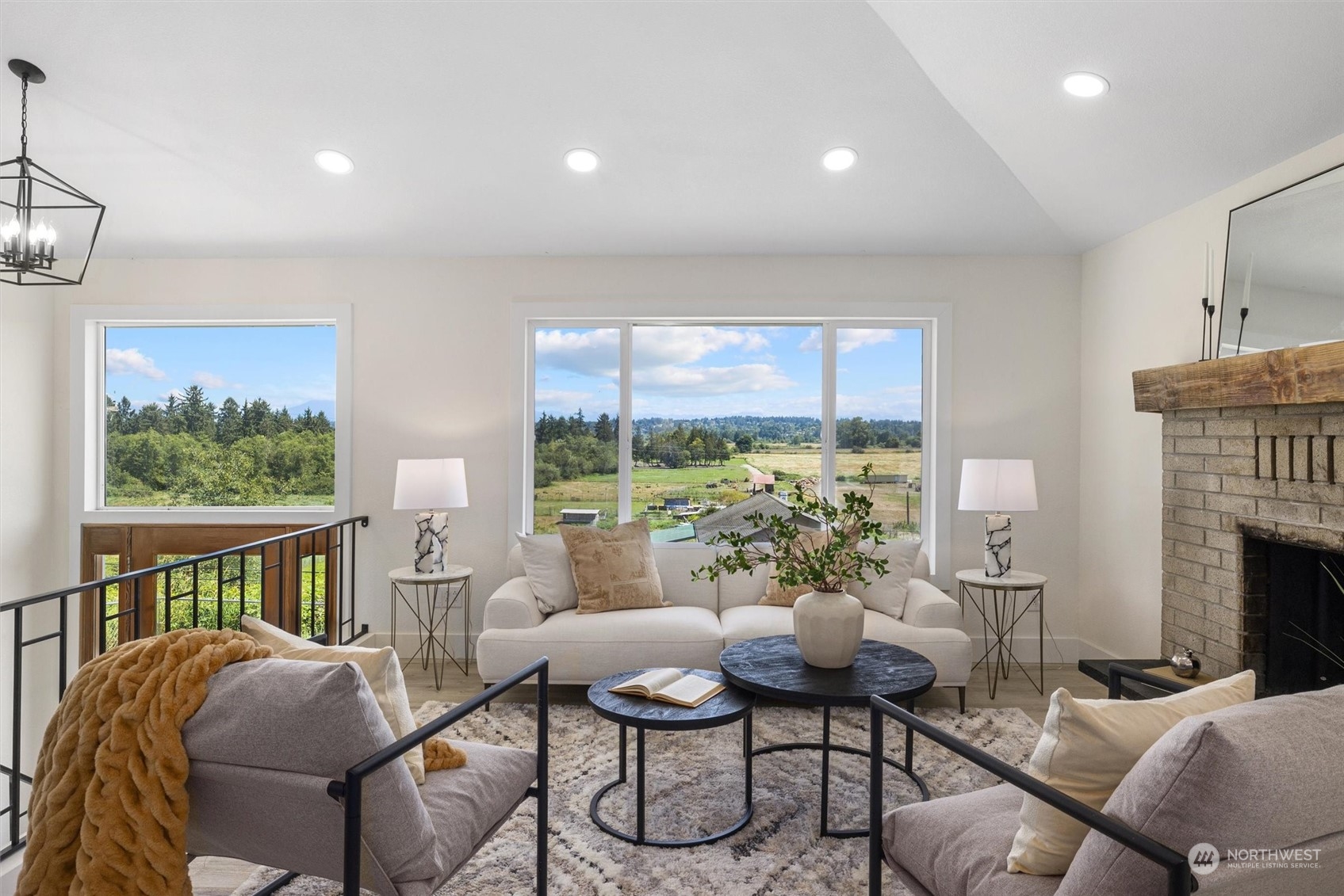 6314 Larimer Road Everett, WA 98208 - Photo 5 of 40 a living room with furniture fireplace and a large window