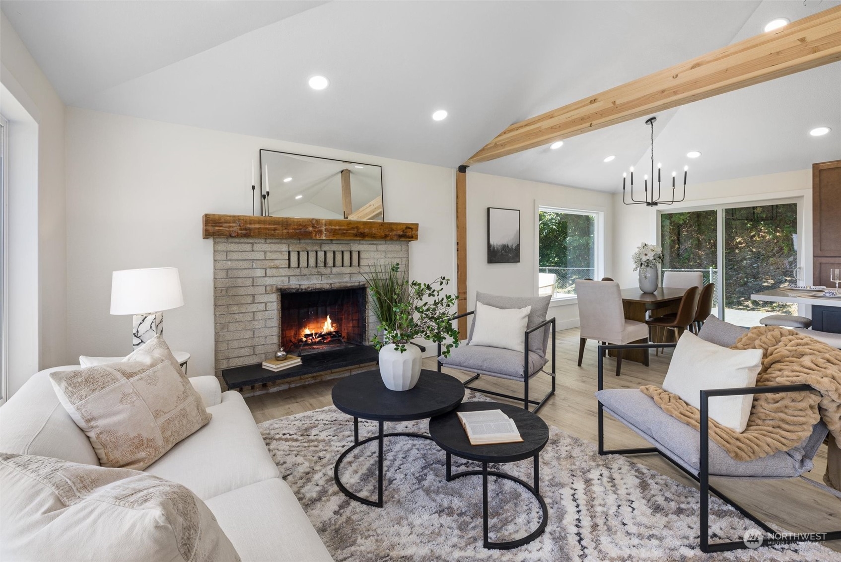 6314 Larimer Road Everett, WA 98208 - Photo 7 of 40 a living room with furniture and a fireplace