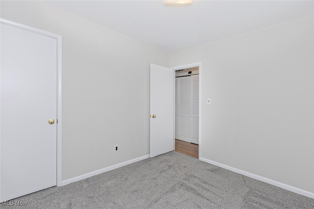1691 Harwich Road Lyndhurst, OH 44124 - Photo 24 of 45 Bedroom featuring baseboards and carpet flooring