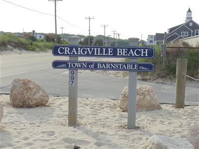 107 Lincoln Road Hyannis, MA 02601 - Photo 14 of 29 a sign broad on the side of a road