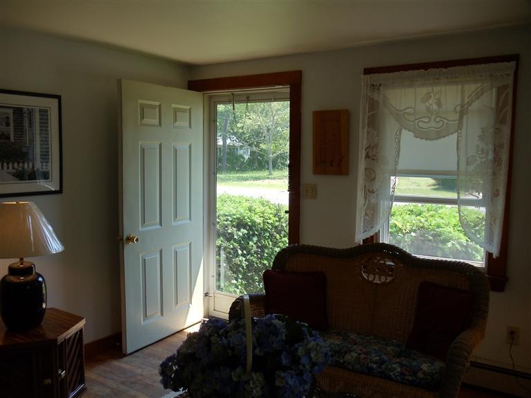 107 Lincoln Road Hyannis, MA 02601 - Photo 20 of 29 a living room with furniture and a window