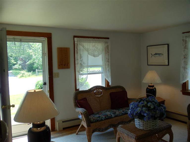 107 Lincoln Road Hyannis, MA 02601 - Photo 23 of 29 a living room with furniture and a window