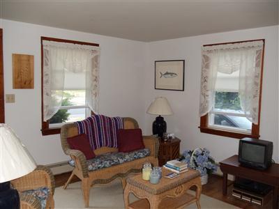 107 Lincoln Road Hyannis, MA 02601 - Photo 9 of 29 a living room with furniture and a window