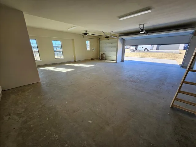 a view of a partially built entryway with a window