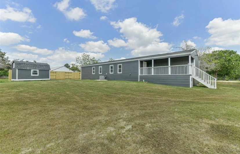 9137 Conner Road Washington, TX 77880 - Photo 14 of 44 a view of a house with a backyard