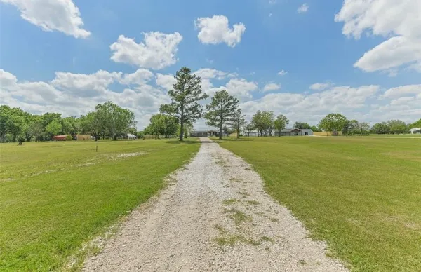 a view of a lake with a big yard