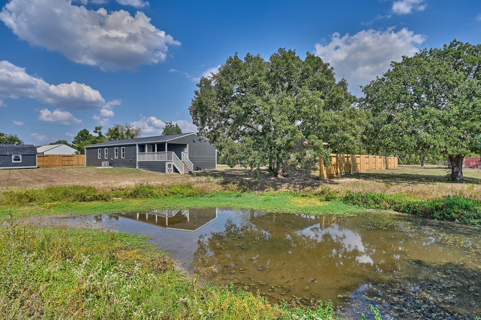 9137 Conner Road Washington, TX 77880 - Photo 23 of 44 a view of a house with a yard