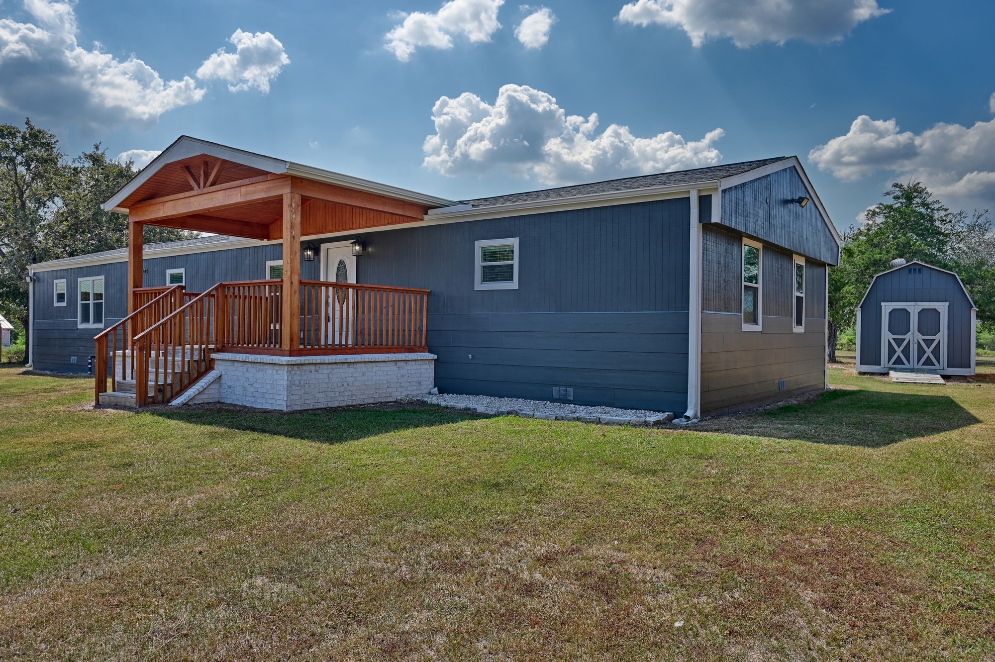 9137 Conner Road Washington, TX 77880 - Photo 24 of 44 a front view of a house with a yard