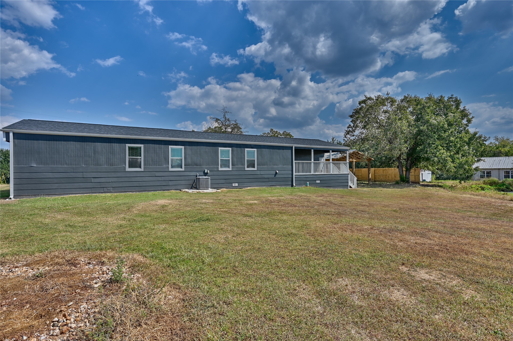 9137 Conner Road Washington, TX 77880 - Photo 31 of 44 front view of house with a yard