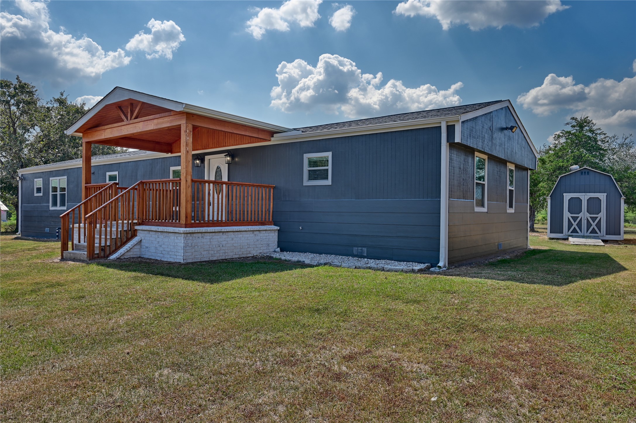 9137 Conner Road Washington, TX 77880 - Photo 34 of 44 a front view of a house with a yard
