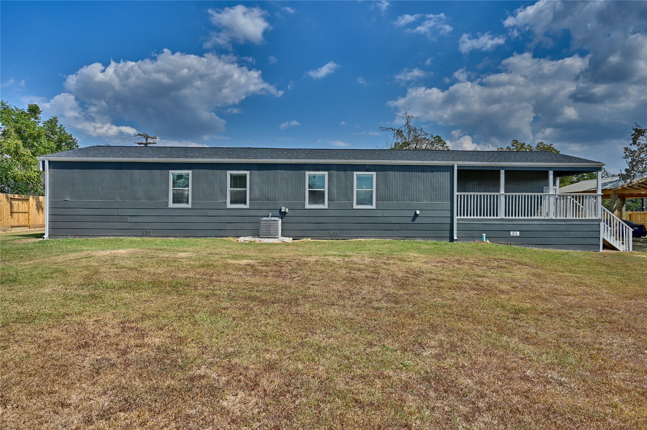 9137 Conner Road Washington, TX 77880 - Photo 5 of 44 a front view of a house with garden