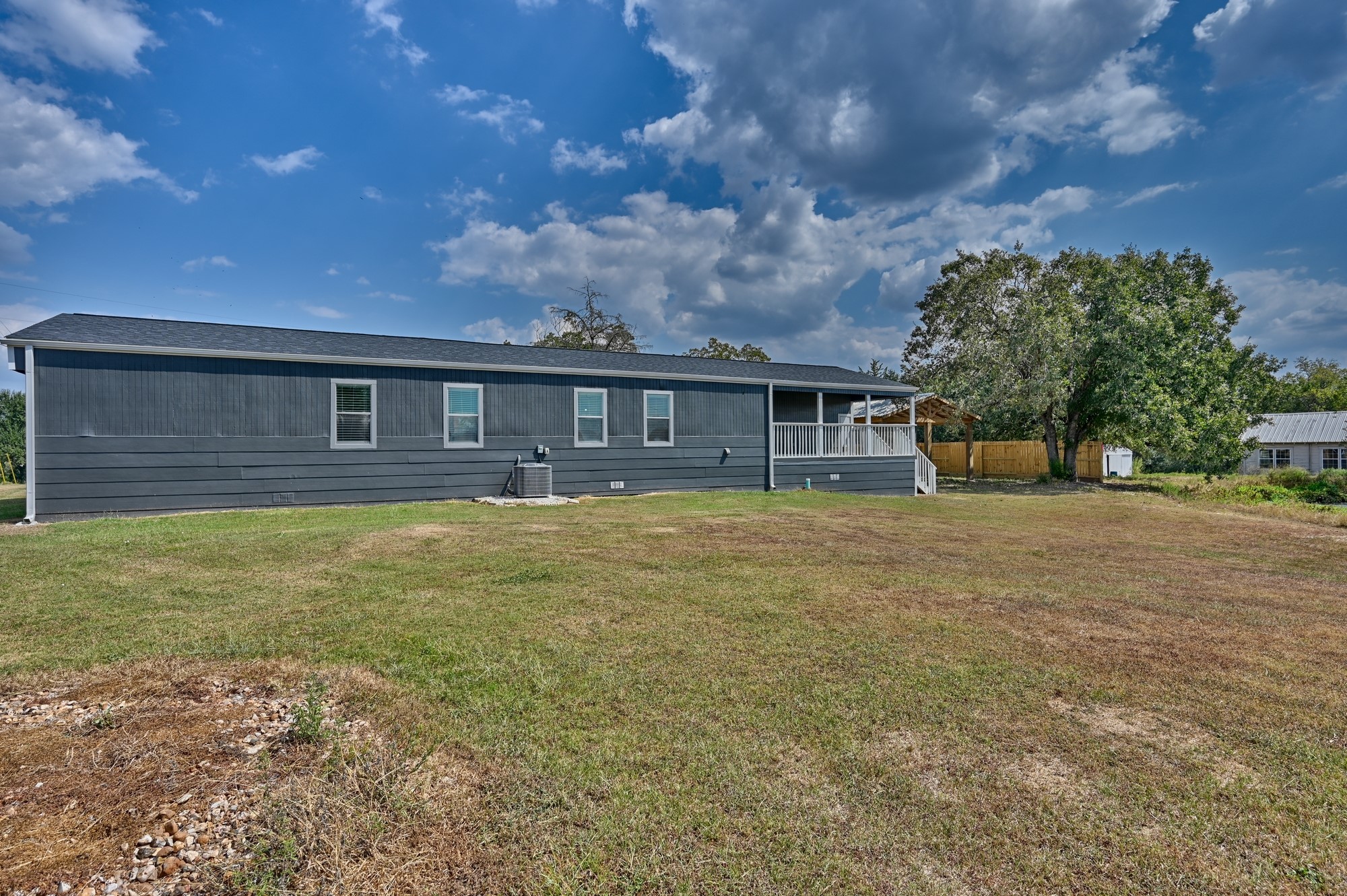 9137 Conner Road Washington, TX 77880 - Photo 7 of 44 front view of house with a yard
