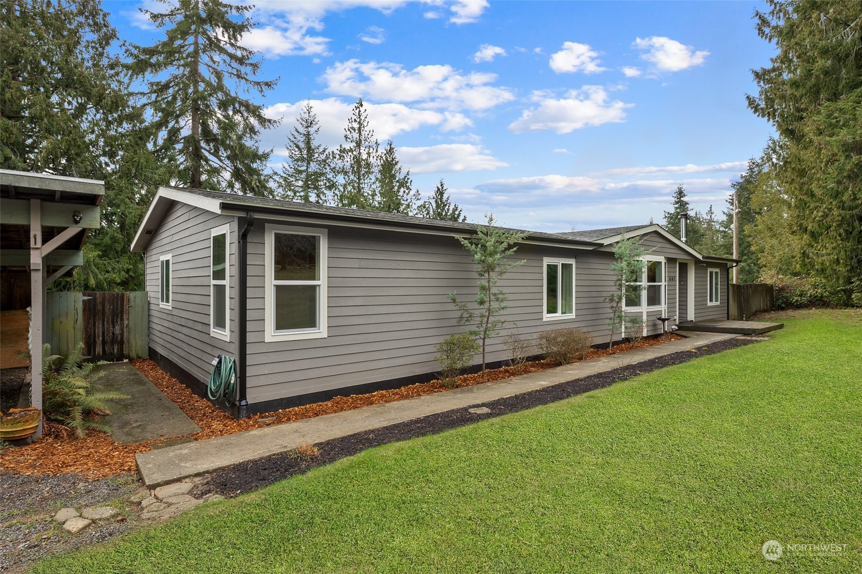 661 Brockway Road Chehalis, WA 98532 - Photo 5 of 40 a front view of a house with a garden