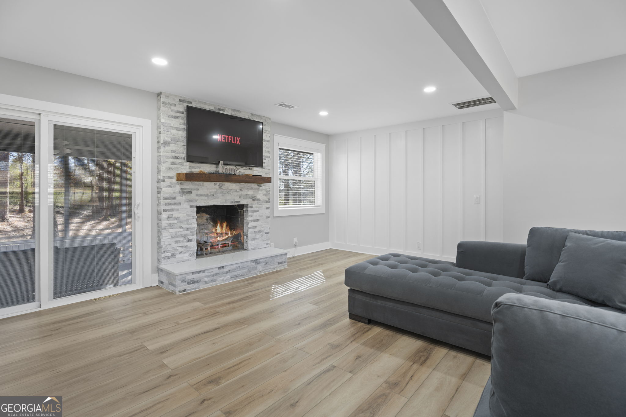 2604 Flat Shoals Road Southwest Conyers, GA 30094 - Photo 15 of 44 a living room with furniture and a fireplace