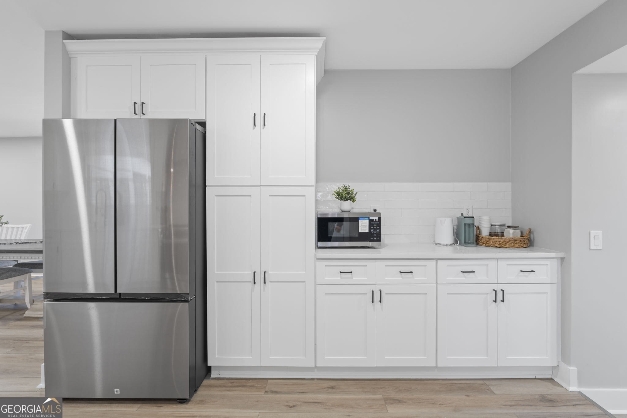 2604 Flat Shoals Road Southwest Conyers, GA 30094 - Photo 20 of 44 a white refrigerator freezer sitting in a kitchen