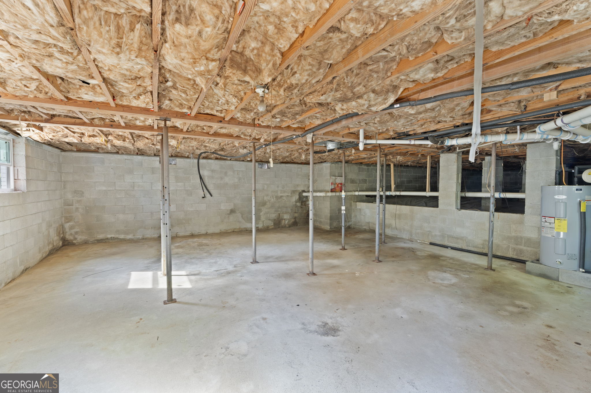 2604 Flat Shoals Road Southwest Conyers, GA 30094 - Photo 38 of 44 a view of a room with wooden walls