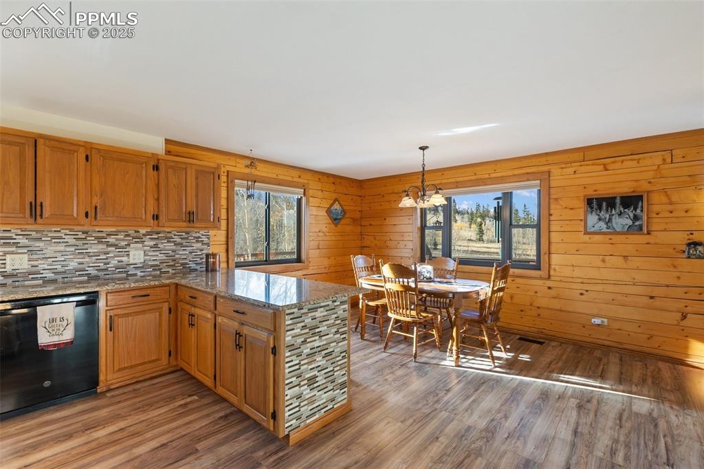 2387 Buffalo Ridge Road Como, CO 80456 - Photo 15 of 50 a open kitchen with stainless steel appliances granite countertop a stove and cabinets