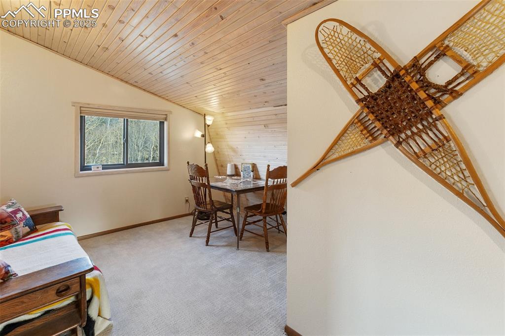 2387 Buffalo Ridge Road Como, CO 80456 - Photo 17 of 50 a view of a livingroom with furniture and a window