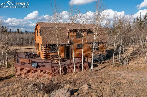 a picture of a table and chairs in the patio