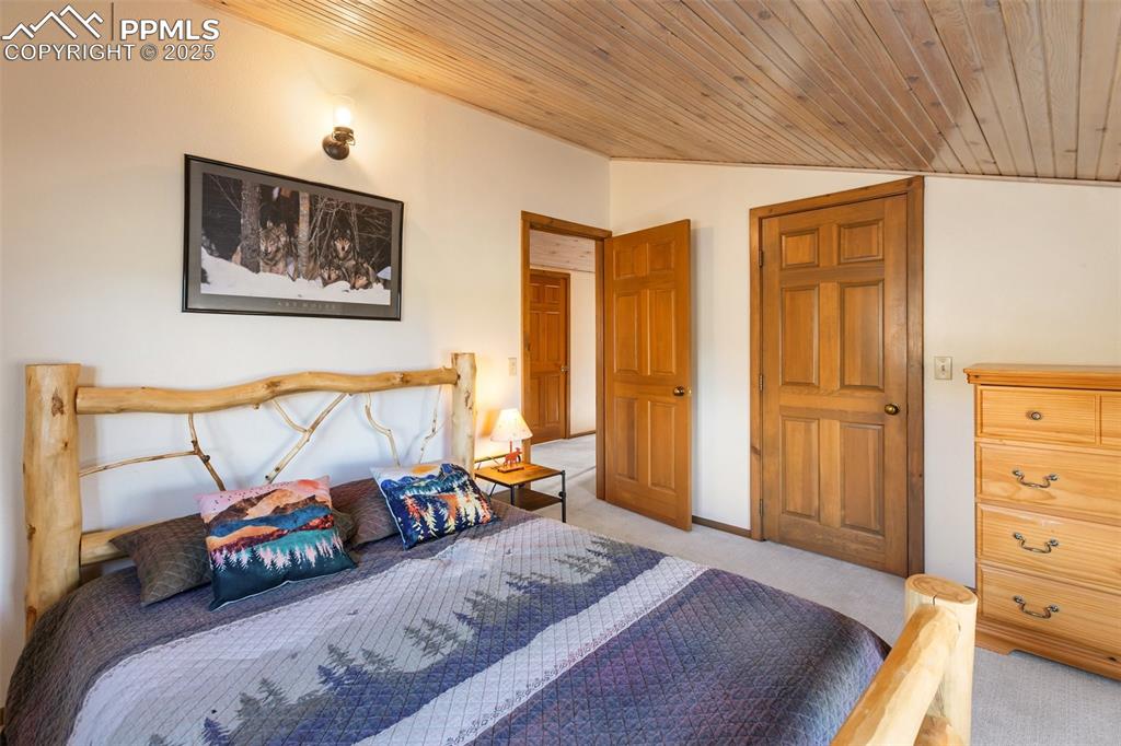 2387 Buffalo Ridge Road Como, CO 80456 - Photo 21 of 50 a bedroom with furniture and a window