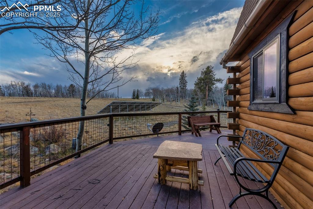 2387 Buffalo Ridge Road Como, CO 80456 - Photo 31 of 50 a terrace with outdoor seating and wooden floor