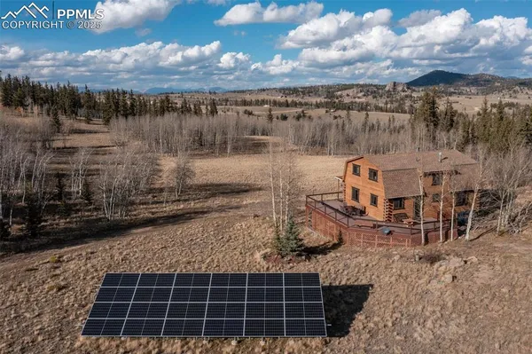 a view of a town with mountains