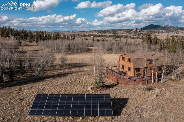 a view of a town with mountains
