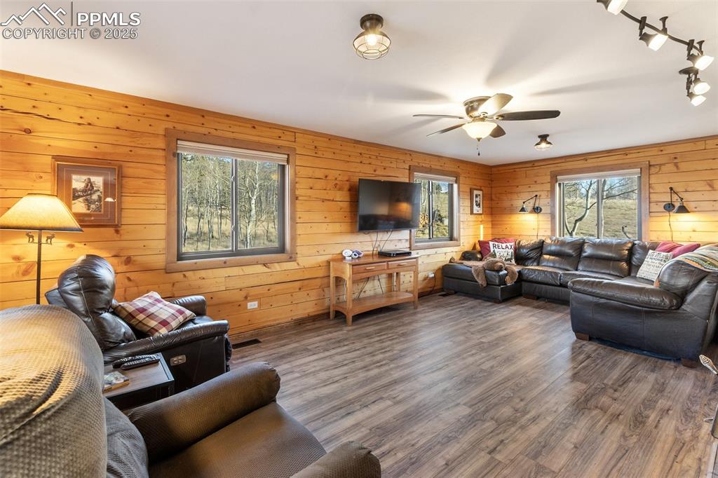 2387 Buffalo Ridge Road Como, CO 80456 - Photo 5 of 50 a living room with furniture or couch and a flat screen tv