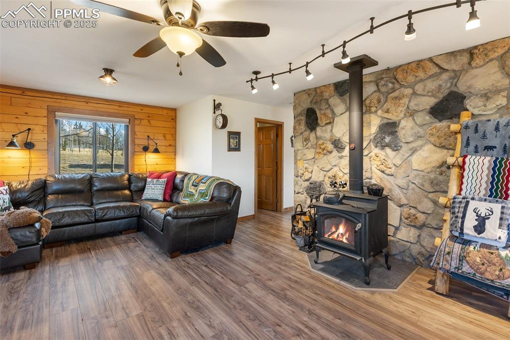 2387 Buffalo Ridge Road Como, CO 80456 - Photo 8 of 50 a living room with furniture and a fireplace
