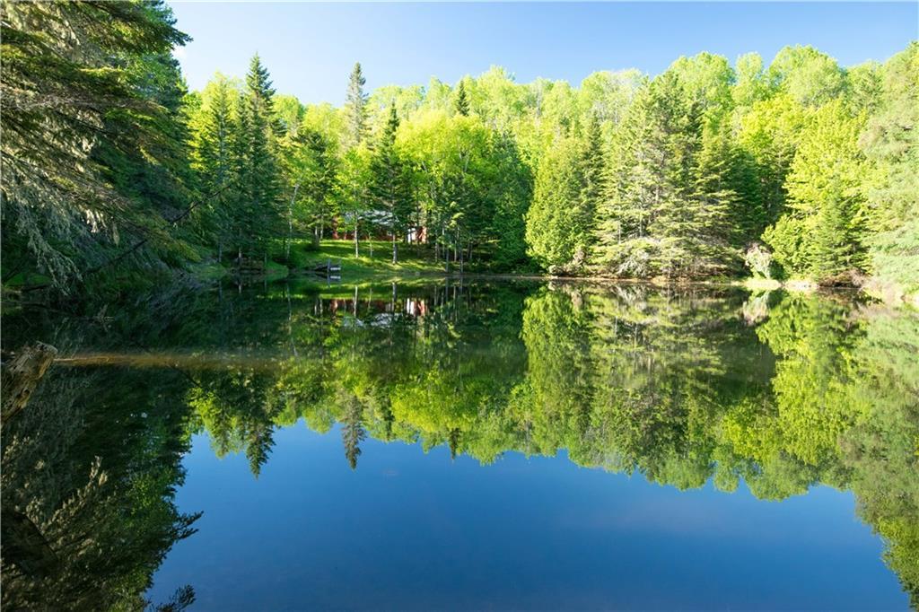 On Jalbert Road Fort Kent, ME 04743 - Photo 11 of 26 Looking from the pond to the cabin