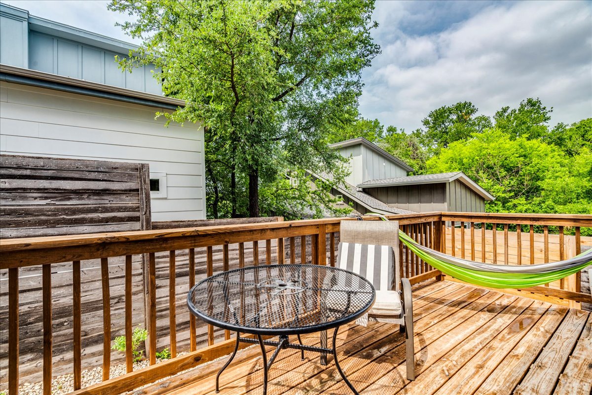1214 Delano Street, Unit 1 Austin, TX 78721 - Photo 25 of 27 a view of a balcony with two chairs