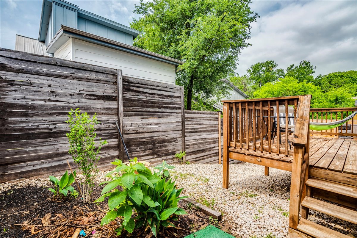 1214 Delano Street, Unit 1 Austin, TX 78721 - Photo 26 of 27 a backyard of a house with a garden