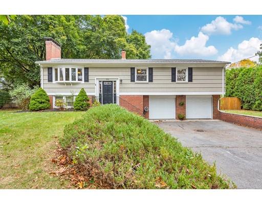 856 Maple Road Longmeadow, MA 01106 - Photo 1 of 27 a front view of a house with a yard