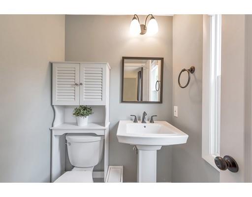 856 Maple Road Longmeadow, MA 01106 - Photo 13 of 27 a bathroom with a toilet sink and mirror