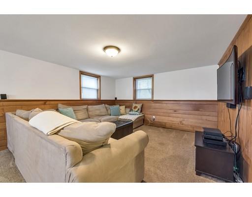 856 Maple Road Longmeadow, MA 01106 - Photo 18 of 27 a living room with furniture and a flat screen tv