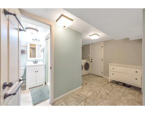 856 Maple Road Longmeadow, MA 01106 - Photo 20 of 27 a bathroom with a tub sink and mirror