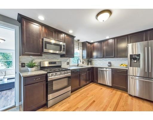 856 Maple Road Longmeadow, MA 01106 - Photo 2 of 27 a kitchen with stainless steel appliances granite countertop a refrigerator a sink dishwasher a stove with wooden floor
