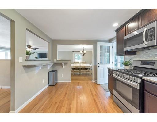 856 Maple Road Longmeadow, MA 01106 - Photo 5 of 27 a kitchen with stainless steel appliances granite countertop a stove and a refrigerator