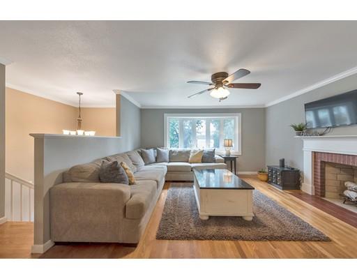 856 Maple Road Longmeadow, MA 01106 - Photo 7 of 27 a living room with furniture and a fireplace