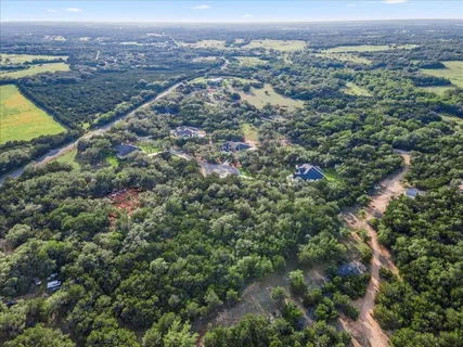 an aerial view of residential building and green space